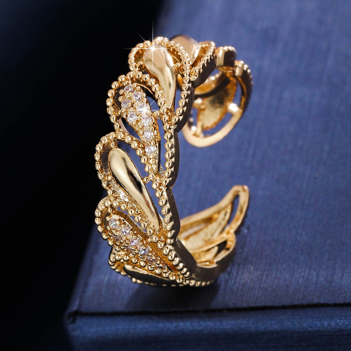 Gold cubic zirconia cutout cuff bracelet by Yoshan, view 2