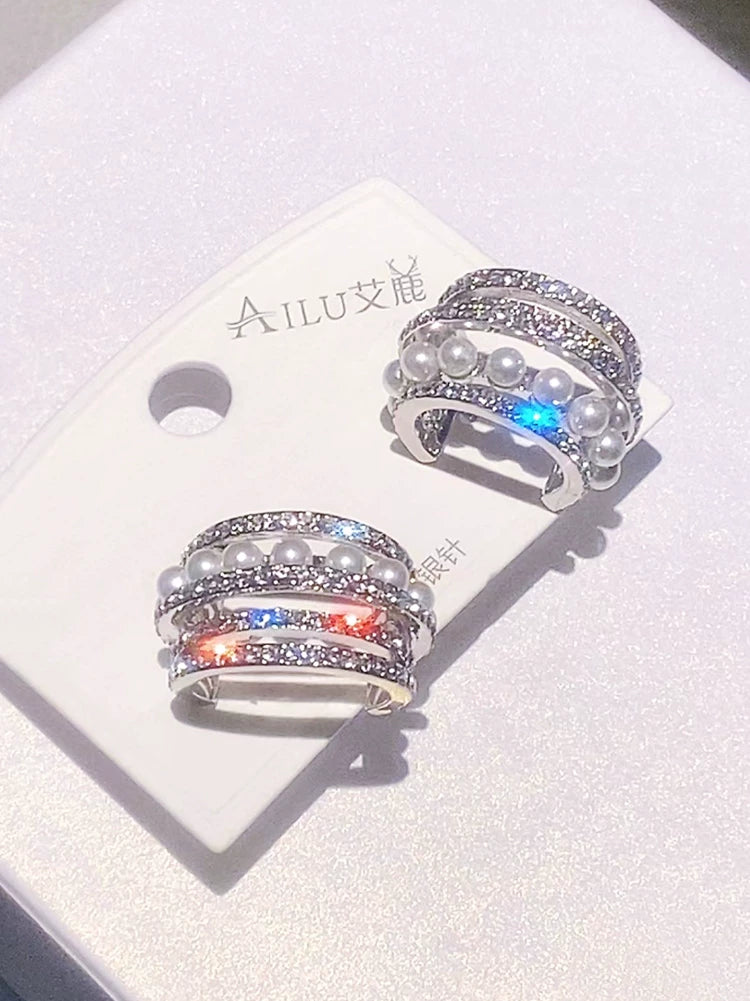 Cubic zirconia crystal stud earrings by Yoshan, detail view 6