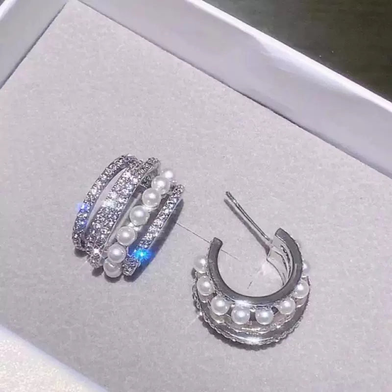Cubic zirconia crystal stud earrings by Yoshan, detail view 10