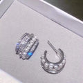 Silver cubic zirconia crystal stud earrings by Yoshan