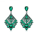 Crystal geometric drop earrings by Yoshan