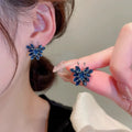 Stud earrings by Yoshan