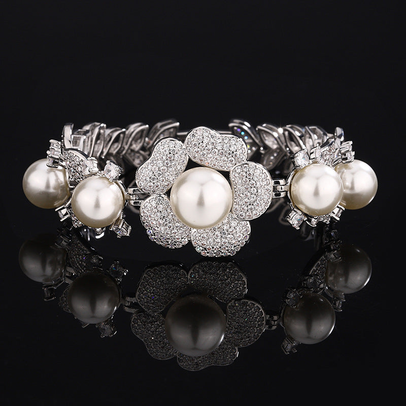 Faux pearl floral cuff bracelet by Yoshan