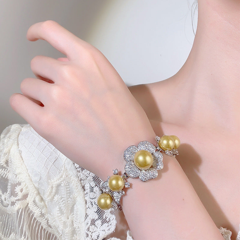 Faux pearl floral cuff bracelet by Yoshan, detail view 4
