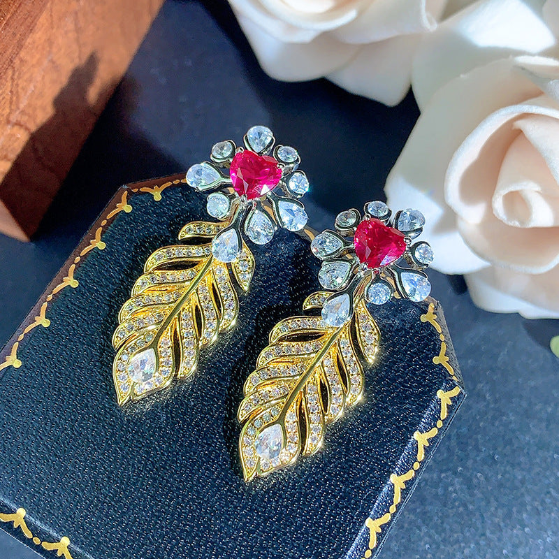 Cubic zirconia floral stud earrings by Yoshan