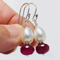 Silver pearl earrings by Yoshan